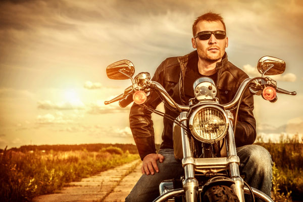 biker wearing sunglasses on motorcycle